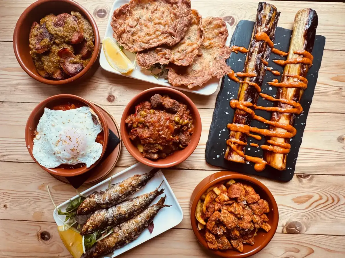 Spanish Tapas Spread with Patatas Bravas, Iberico Ham (Jamón) and Crispy Croquetas - Authentic Spanish Tapas at Olé Tapas in Bath City Centre